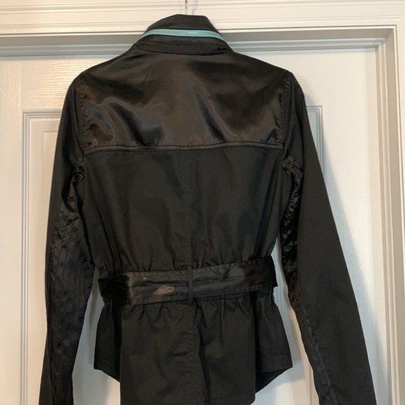 Kenneth Cole peplum style trench with black satin accents with pop of teal - Picture 5 of 5